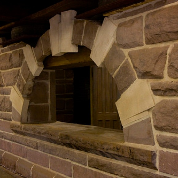 The brownstone and granite masonry in the basement originated at the Heublein Hotel and the YMCA in Hartford (and other, unidentified buildings in Hartford and Rockville).